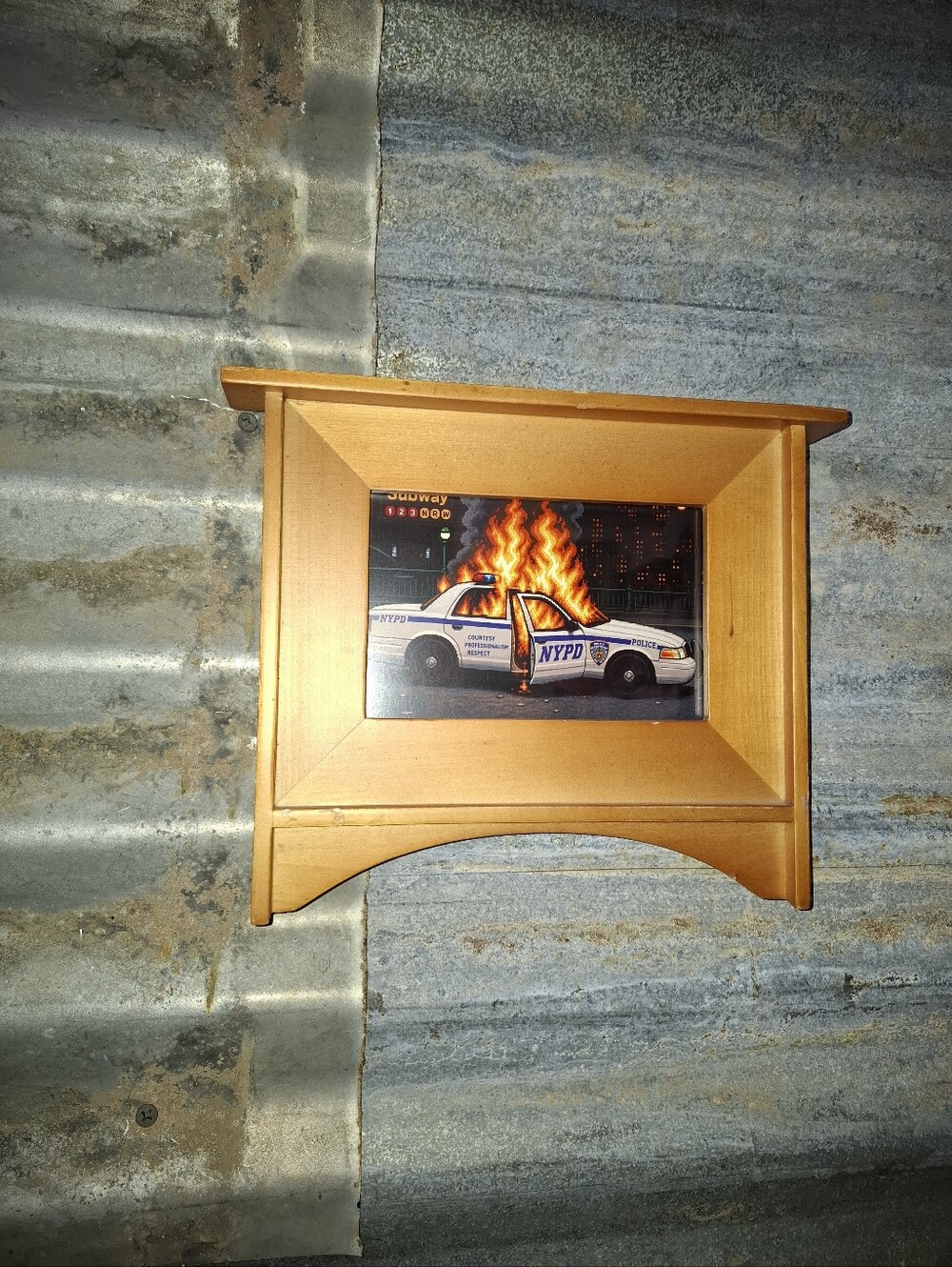 8 Bit NYPD Car On Fire Framed Mini Art Print By Neon Nicho